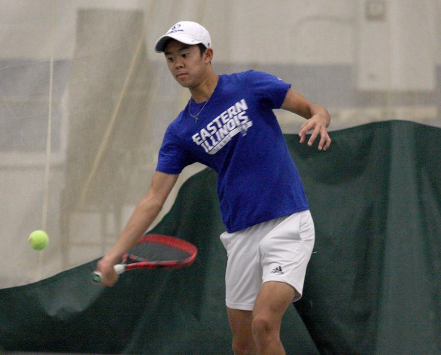 Freshman Kaisei Kuroki returns the ball in practice to freshman Logan Charbonneau in practice Wednesday in the Lantz Fieldhouse. Kruroki is from Tokyo.