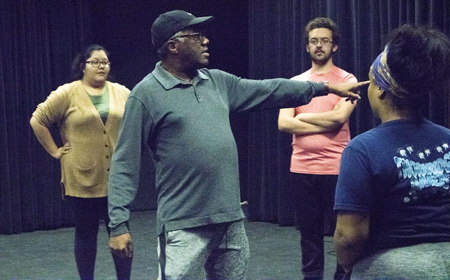 Ron Himes, director and founder of the Saint Louis Black Repertory (center), rehearses with students at the Black Box located in the Doudna Fine Arts Center Monday night.