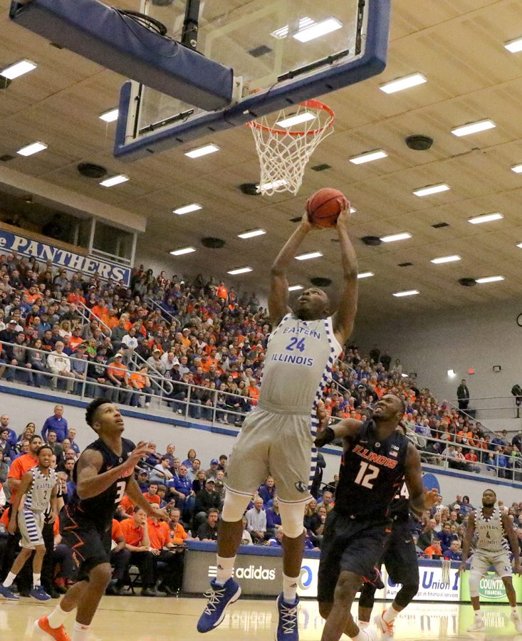 Junior Jajuan Starks goes up for the dunk in Eastern’s win over Illinois Nov. 3 in Lantz Arena. Starks is the Panthers’ leading scorer and said they need to get better at closing out games.