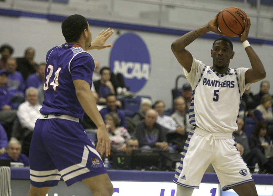 Senior Ray Crossland looks for a teammate to pass to during the first half of Thursday’s matchup with Tennessee State.