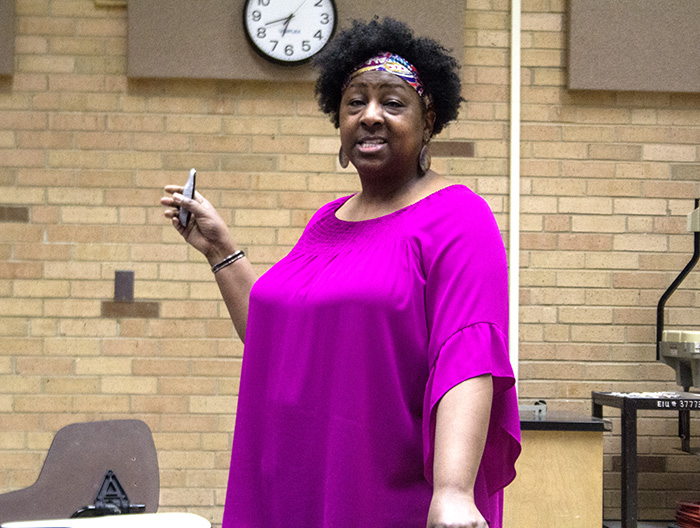 Maggie Burkhead, the director of Trio services provides students with financial advice to help them avoid debt and plan for the future at a lecture in Phipps Lecture Hall in the Physical Science Building on Wednesday evening.