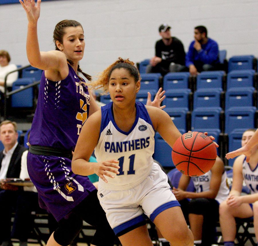 Freshman Karle Pace dribbles past Tennessee Tech’s Mackenzie Coleman in Eastern’s 60-57 loss Saturday in Lantz Arena. Pace finished with 18 points.