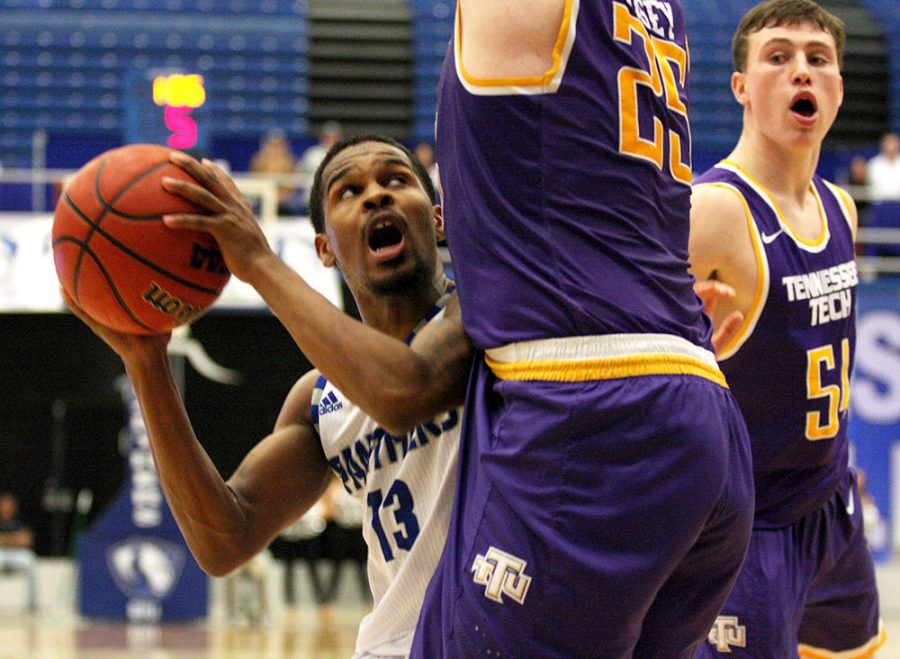 Redshirt junior guard throws up a layup high off the backboard at the end of the shot clock in Eastern’s 79-71 win over Tennessee Tech Saturday in Lantz Arena. Wilson injured his left hand in the game and is out the rest of the season. He is the fourth point guard to be injured this year.