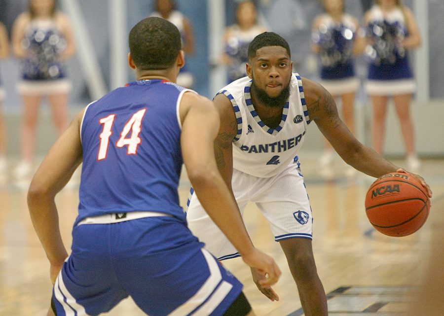 Senior Montell Goodwin eyes up his defender in Eastern’s loss to Belmont Jan. 11. The Panthers host Murray State for one of its final two regular season games Thursday in Lantz Arena..