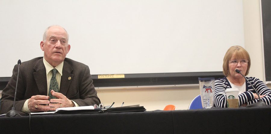 Terry Davis and Shirley Bell, discuss their campaign plans prior to the primary election for the 110th State District Representative, Thursday night in the Coleman Lecture Hall.