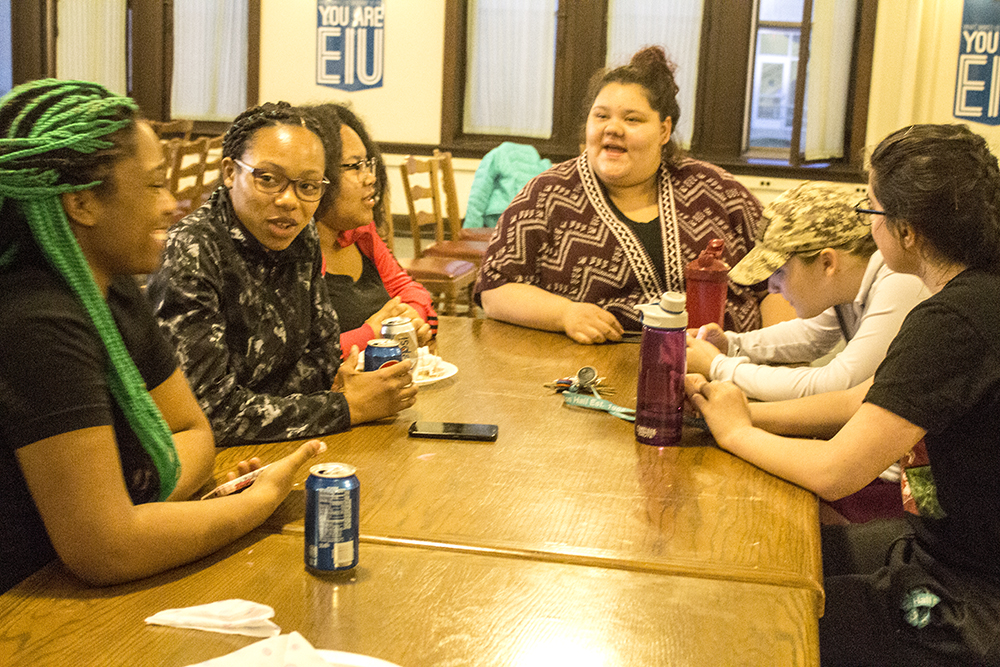 Students socialize during the "Hunger Banquet,” a meal meant to demonstrate hunger disparity.