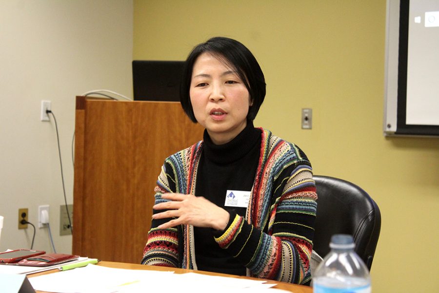 History professor Jinhee Lee discusses President Donald Trump’s involvement with North Korea at a panel inside of Booth Library Monday.