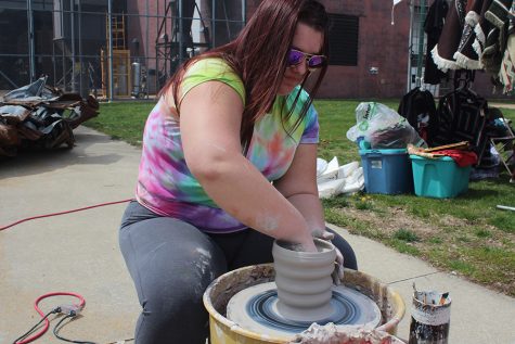 Olivia Jakubowski, a senior graphic design major uses a pottery wheel to make a stein to be sold at Celebration on Saturday. “I like the unique shape,”Jakubowski said.