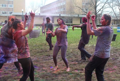 Students dance to traditional Indian tunes at Holi: the Festival of Colors on Saturday morning in the South Quad.