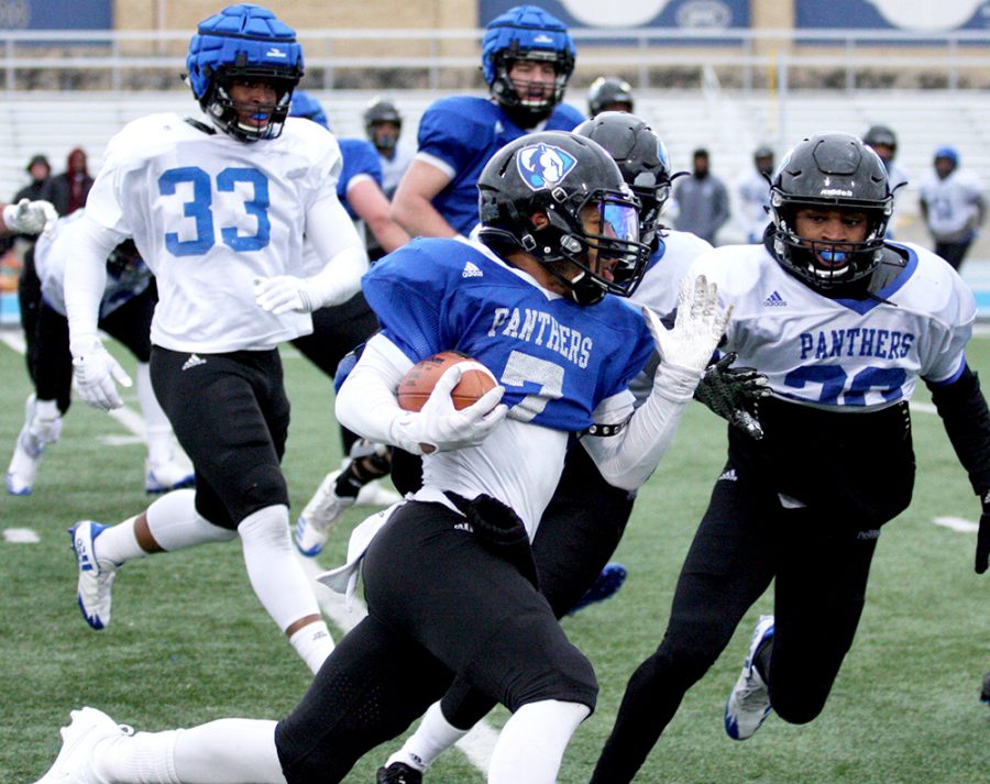 Redshirt senior Aaron Gooch runs up the field in Eastern’s spring practice April 4 at O’Brien Field. Eastern’s offense showed signs of getting the new offense to click and the defense continued to be solid just as it was last year.