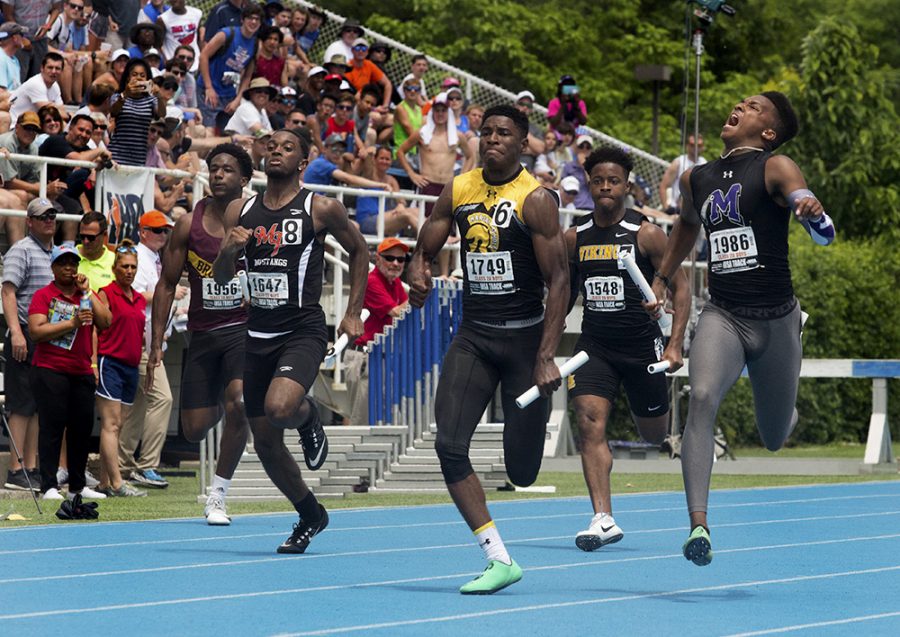 Class 2A competes in the 4X800-meter relay in the IHSA Boy’s Track & Field State Finals.