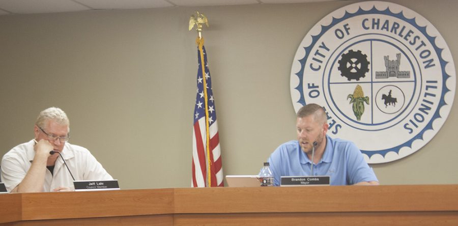 Councilman Jeff Lahr, and Mayor Brandon Combs, go over street closure requests for the Fourth of July festivities, Tuesday night at the City Council meeting. Combs and the rest of the council agreed to the street closures for the parade and other festivities.