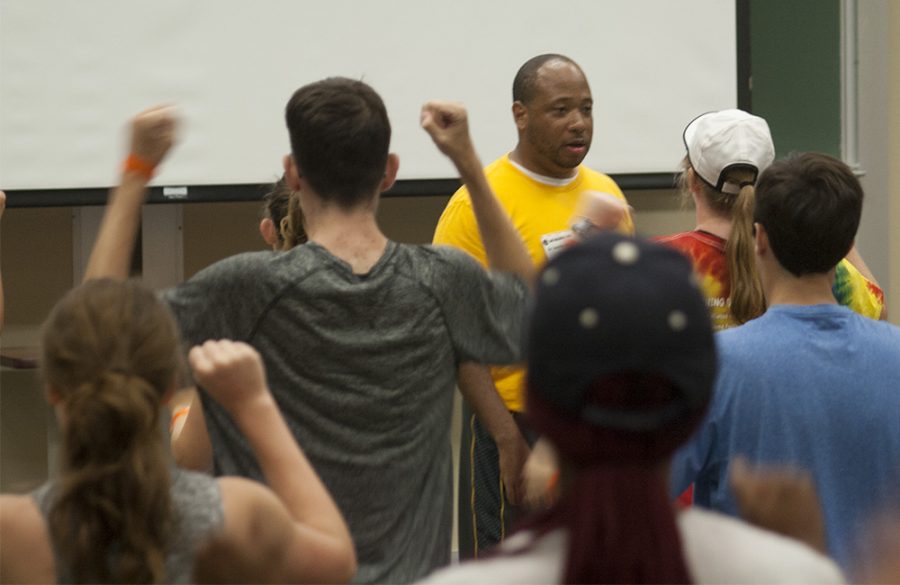 Mary Ellen Greenburg |The Daily Eastern NewsKelvin Jones, Marching Band Director at Louisiana State University, guides campers for the Smith Walbridge Drum Major Clinic in the crest of their piece Tuesday afternoon in the auditorium at Buzzard Hall. This is Jones’s second year with the camp and the 30th annual camp that has been at Eastern.