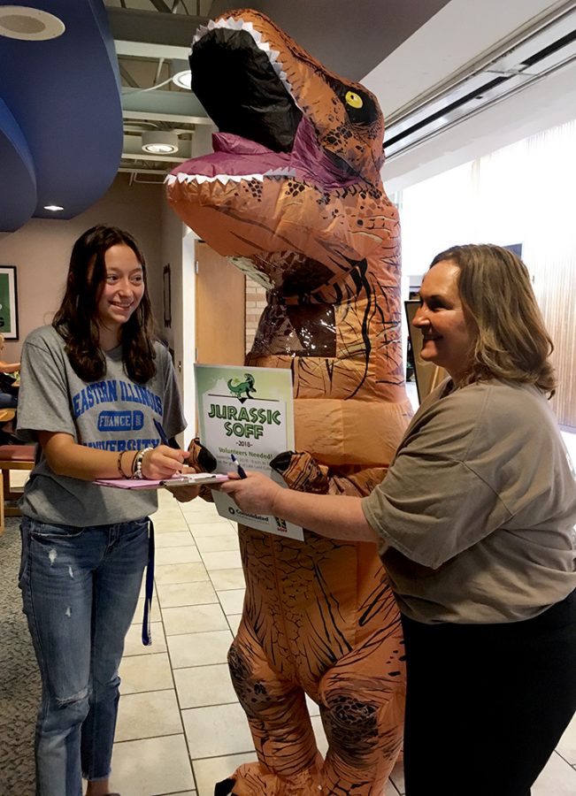 Kayla Jandek, a freshman finance major, speaks to Laura Diltz and Elizabeth Stark about the special olympics event JURASSIC SOFF at Lakeland College on Saturday, September 15. “We cannot do this event without Eastern Illinois University volunteers,” Diltz said.