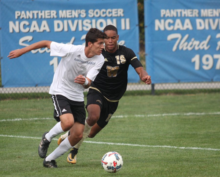 File Photo | The Daily Eastern News
Eastern’s Edgar Mesa pursues a ball in a game last season at Lakeside Field against Western Michigan. Mesa was named one of two Eastern players to watch in the Summit League.