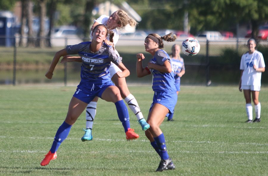 File Photo | The Daily Eastern News
Eastern junior Hannah Heinz heads a ball over a Fort Wayne defender in a 3-2 Panther win at Lakeside Field. Eastern finished last season with a 5-12-2 record.