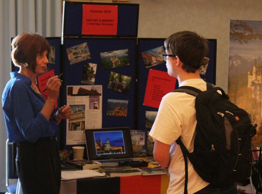 Christiane Eydt-Beebe, foreign languages department chair, talks with Eastern student Paul Blanchard about study abroad opportunities at the Study Abroad Fair on Sept. 5.