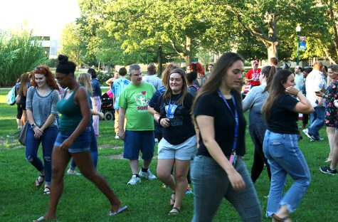People play the game “Me, Too!” at the Best Buddies welcome back mixer Thursday evening in the South Quad. “Me, Too!” Is an icebreaker game where a person stands in the middle of a circle and says something about themselves such as “My favorite color is blue,” if another person agrees with them they say, “Me, Too!” and switch places with someone else. According to their website, Best Buddies is an non-for profit organization dedicated to ending the social, physical and economic isolation of the 200 million people with intellectual and developmental disabilities.