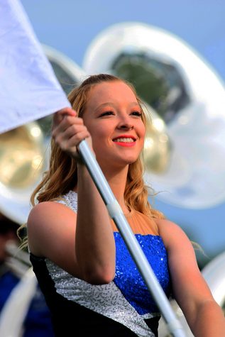 A member of the Eastern Marching Band, twirls a flag during the half time show at the Eastern vs. Tennessee State football game Saturday afternoon at O’Brien Stadium.