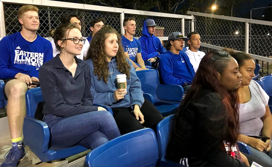 Eastern students watch the softball game Thursday night at the baseball field.
