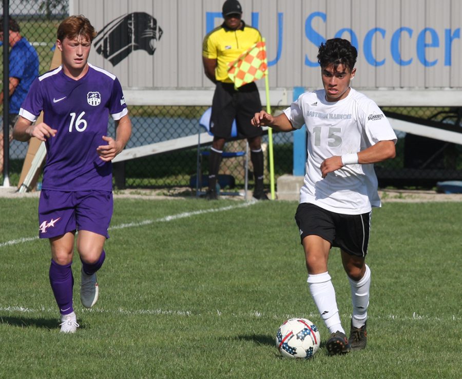 Eastern redshirt-freshman Zabdiel Justiniano dribbles a ball in a match against Evansville at Lakeside Field on Aug. 31. Eastern tied with the Purple Aces 1-1.