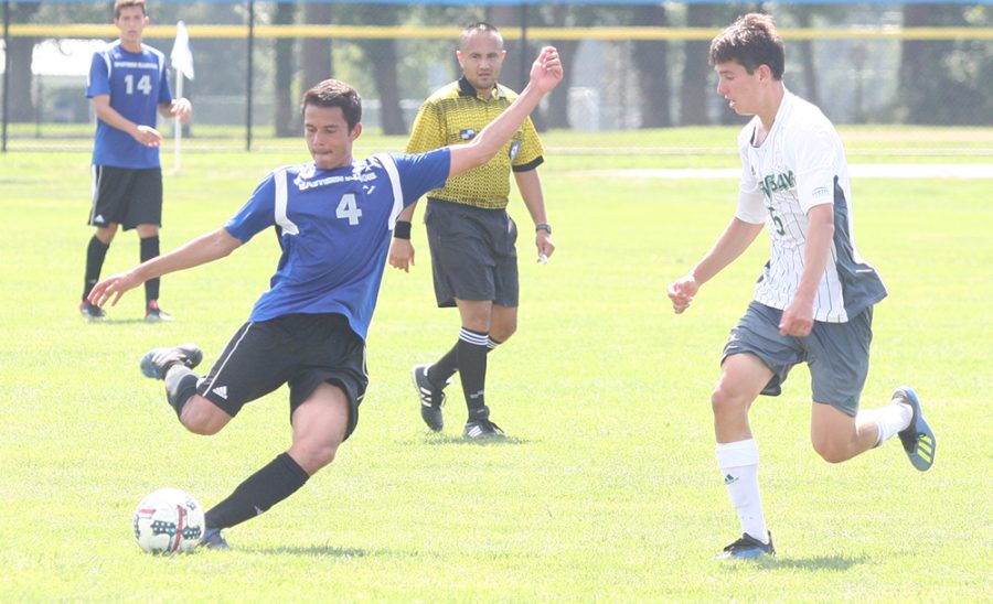 Eastern junior Matheus Santos strikes a ball in a match against Green Bay at Lakeside Field on Sept. 2. Green Bay won the game 1-0.
