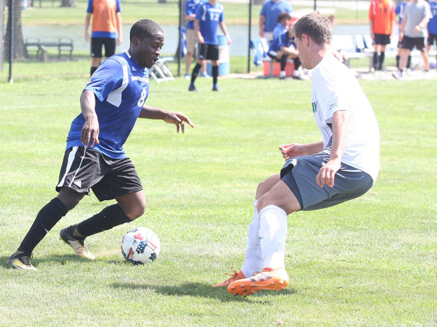 Eastern senior Kris Luke dribbles around a Green Bay defender in a 1-0 loss on Sept. 2 at Lakeside Field. The Panthers are 2-2-2 on the season.