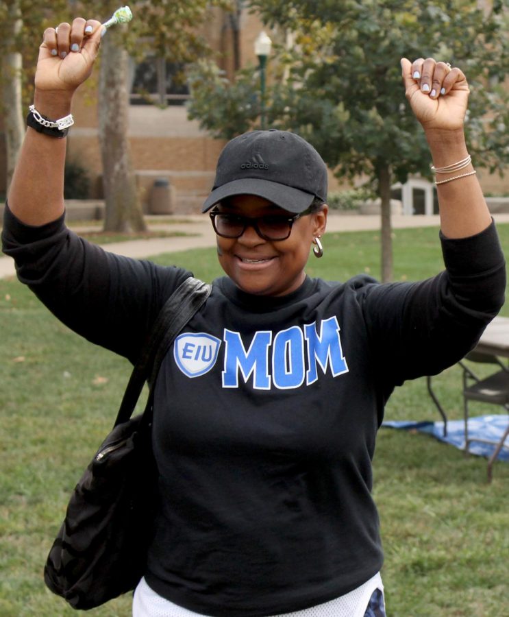 Lashonda Banks celebrates her win at balloon darts at the RHA Family Carnival. Banks was visiting her son Jeremy Banks for Family Weekend. “Family Weekend is very important to us because we still get to be together with (Jeremy) who is now apart from us,” Banks said.