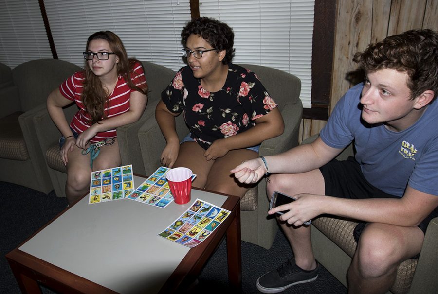 Students play Loteria during “Loteria and Game Night” Monday night at the Cultural House. Loteria is a game similar to bingo, except instead of numbers on ping pong balls there are images on a card.