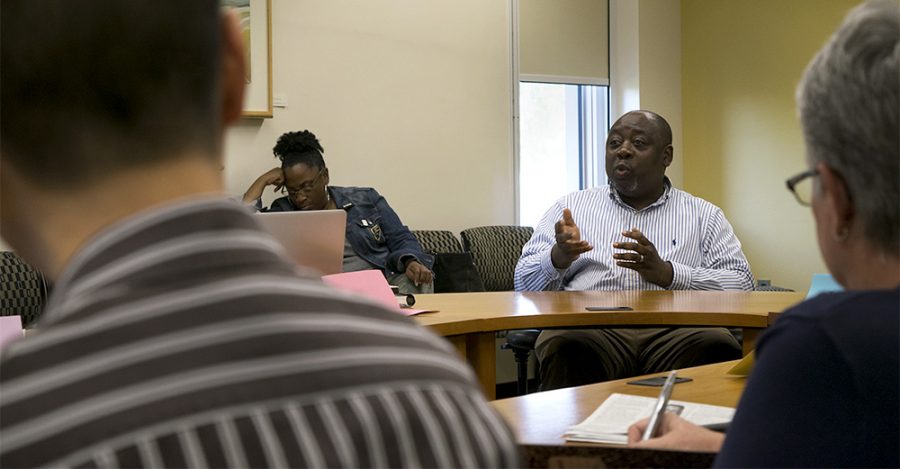 Mutombo Kabasele is the associate dean of the office of international students and scholars. He updated the Faculty Senate on international student enrollment and the process it takes to get them to Eastern.