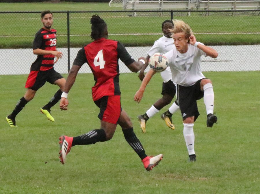 Cameron Behm gets ready to settle the ball with teammate Kris Luke running behind him and a Northern Illinois defender running toward him during a 2-0 loss on Sept. 21 at Lakeside Field.