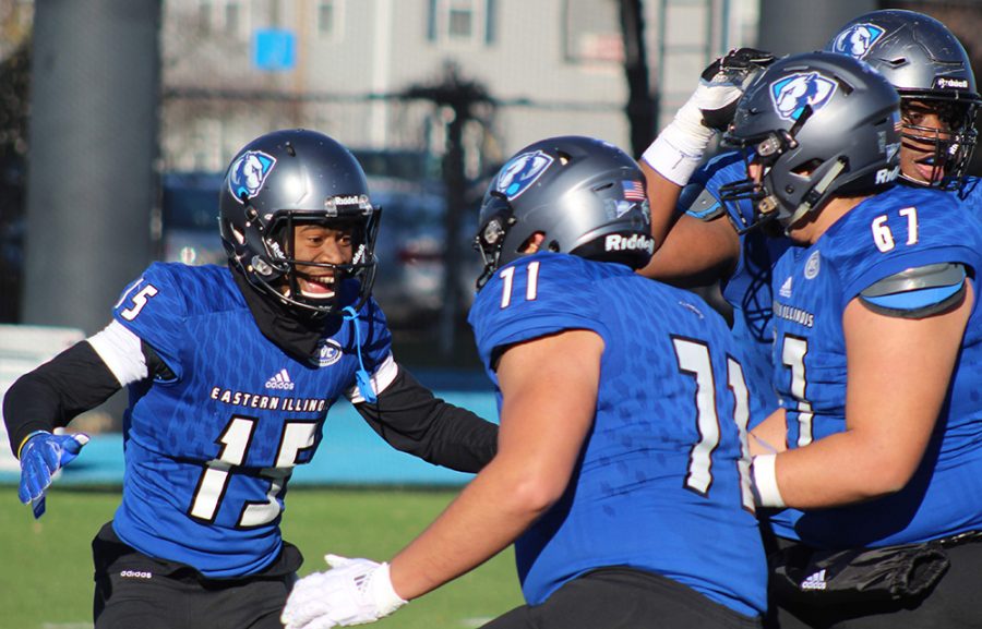 Members of the Eastern football team celebrate a touchdown in the team’s 52-21 win over Austin Peay on Saturday. The win moved Eastern to 3-4 in conference play and 3-7 overall, Eastern began the season 0-4.