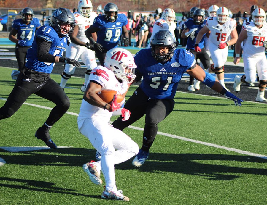 Eastern linebacker Dytaroius Johnson prepares to hit an Austin Peay all carrier in the Panther’s 55-21 win over the Governors on Nov. 11. Eastern is 3-4 in conference play and has a chance to move to 4-4 Saturday against Southeast Missouri.