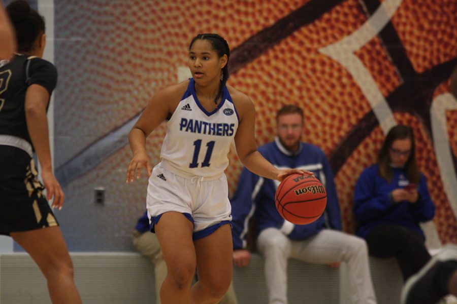 Eastern sophomore guard Karle Pace takes the ball up court in the Panthers’ 72-63 win over Fort Wayne at Lantz Arena on Thursday. Pace scored a game-high 28 points and made six three-pointers in the win.