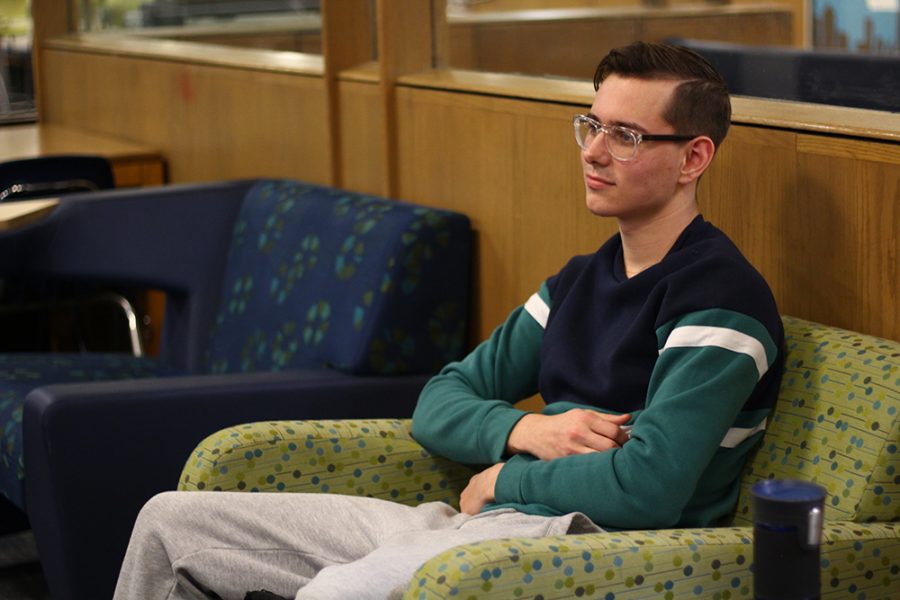 Matt Banks, a freshman marketing major, relaxes in the Taylor Hall lobby Tuesday evening. He said he was just “chilling out after a long day of classes”.