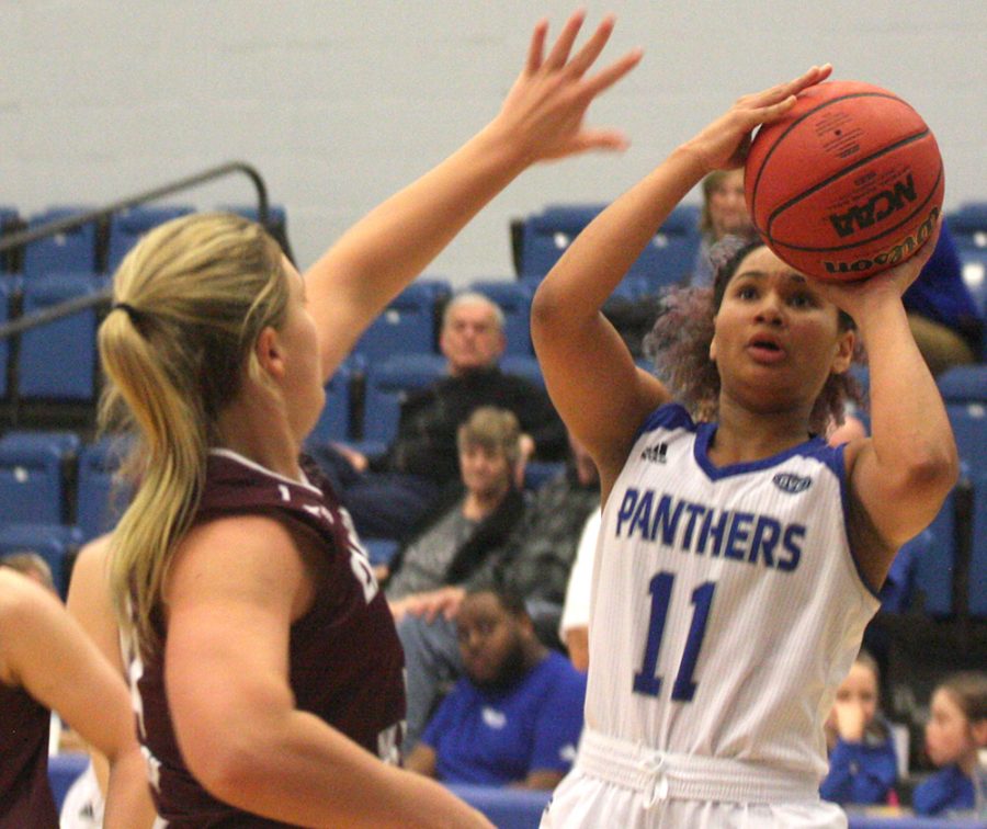 Eastern guard Karle Pace takes a shot in the Panthers 80-60 win over Eastern Kentucky Thursday night in Lantz Arena. Pace scored a game-high 29 points in the win.