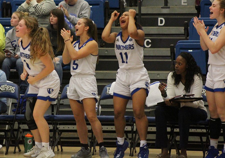 Members of the Eastern women’s basketball team celebrate during the team’s 102-43 win over Oakland City on Nov. 3. The Panthers are 7-6 this season, they were 3-26 last year.