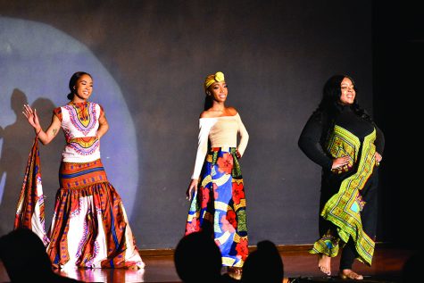 The contestants dress in African garment pieces to show what they believe a strong African-American woman looks like during the 48th annual Miss Black EIU scholarship pageant in the Grand Ballroom of the Martin Luther King Jr. Union on Saturday evening.