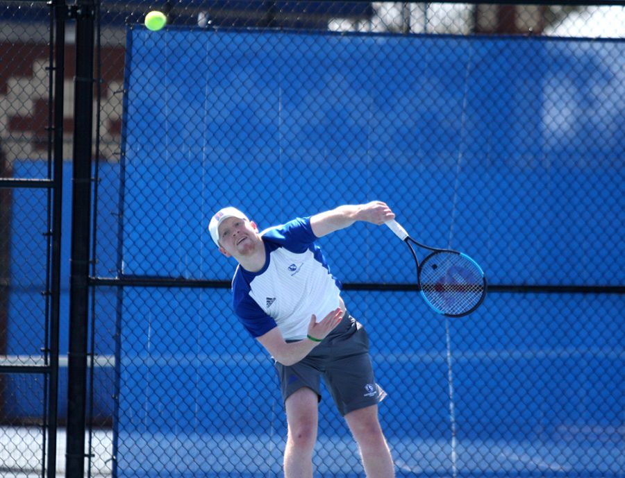 Eastern junior Freddie O’Brien returns a ball in a match last spring at the Darling Courts. O’Brien and Eastern have two matches upcoming this weekend.