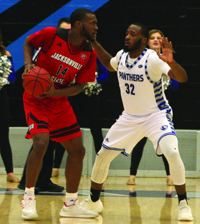 Jacksonville State’s Jason Burnell (14) works on Eastern’s JaQualis Matlock in the Gamecock’s 89-84 win over Eastern on Feb. 28 in Lantz Arena. Jacksonville State finished OVC play with a 15-3 record.