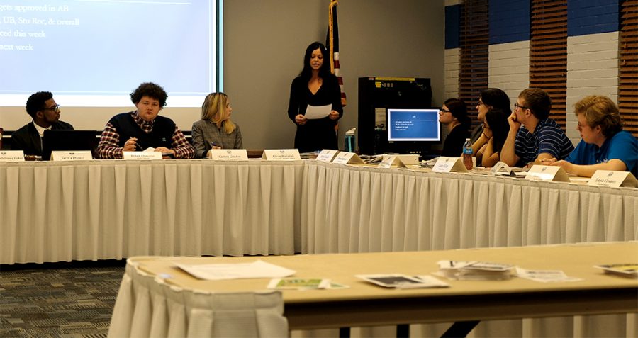 Alicia Matusiak (center), student VP of student affairs, addresses the senate Wednesday night at the Student Senate meeting in the Martin Luther King Jr. University Union.