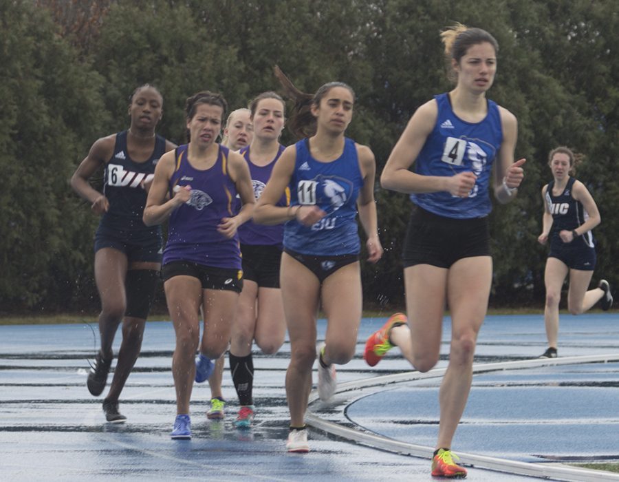 Eastern’s Jocelyne Mendoza (11) and Grace Rowan (4) lead a pack of runners at the EIU Big Blue Classic this weekend at O’Brien Field.
