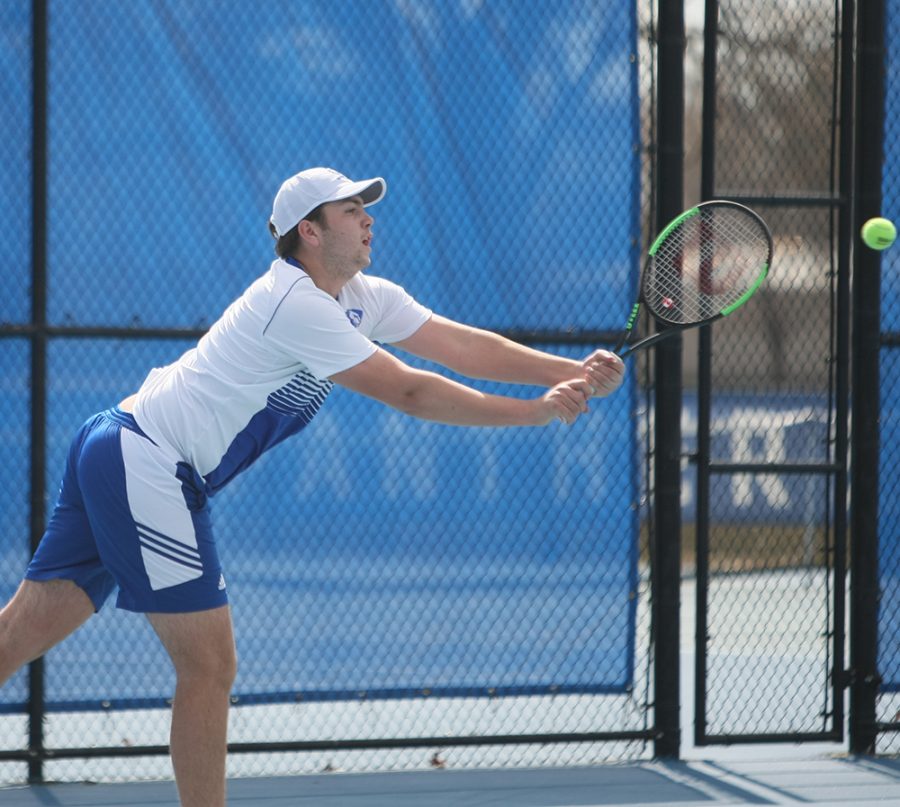 Dillan Schorfheide | The Daily Eastern News
Gage Kingsmith lunges to return a hit in a doubles match during the men’s tennis team’s 6-1 loss to Jacksonville State March 22 at the Darling Courts.