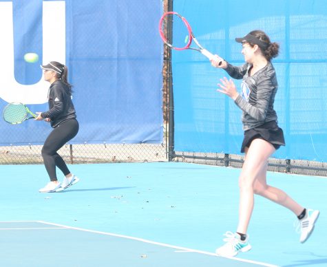 Abby Carpenter returns a hit in her singles match during Eastern’s 4-3 loss March 22 to Jacksonville State at the Darling Courts. Carpenter is one of two seniors on the team graduating.