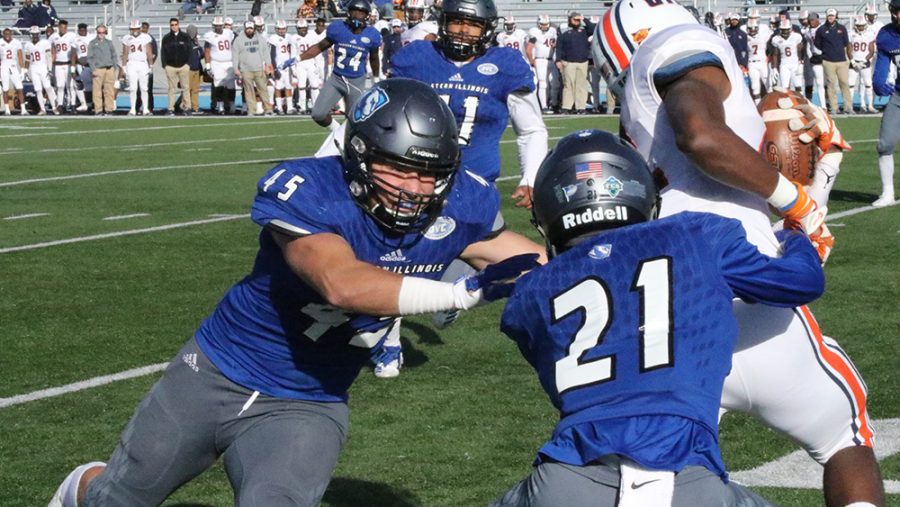 File Photo | The Daily Eastern News
Eastern linebacker Joe Caputo (left) and defensive back Mark Williams team up to bring down a Tennessee Martin ballcarrier on Oct. 20 last season. The Panthers won the game 24-21 in overtime. 