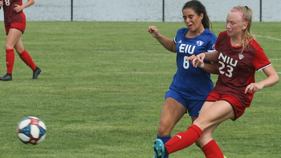 Dillan Schorfheide | The Daily Eastern News
Eastern forward Pilar Barrio bumps a defender to try to get the ball back during the women’s soccer team’s 1-1 tie with Northern Illinois Friday at Lakeside Field.