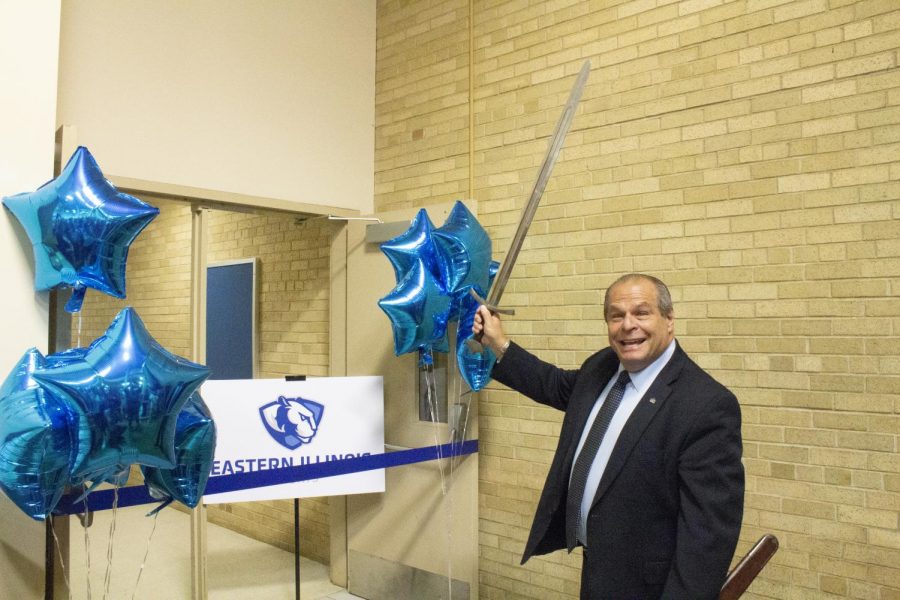 Eastern+President+David+Glassman+is+ready+to+cut+the+ribbon+with+a+sword+for+the+new+eSports+arena+in+Lantz+Arena.+The+arena+will+host+video+game+tournaments+and+teams.+