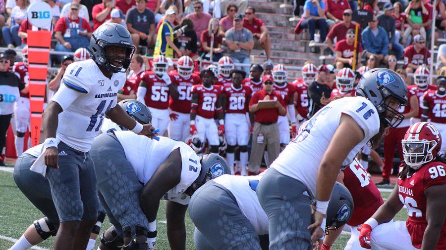 Adam Tumino | The Daily Eastern News
Johnathan Brantley calls out commands to his offense before the play. Eastern lost 52-0 to Indiana Sept. 7 at Memorial Stadium.