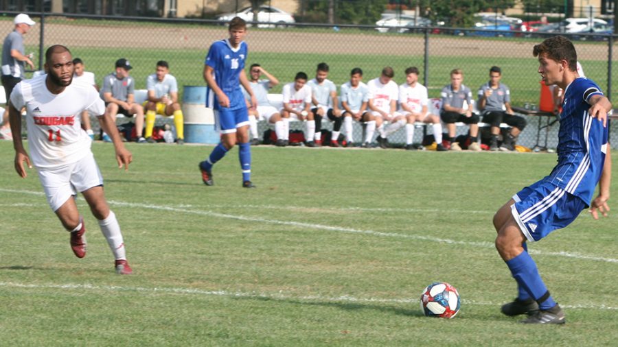 Karina Delgado | The Daily Eastern News
Edgar Mesa, the captain of the men’s soccer team, starts to make a pass to a teammate. Eastern defeated St. Xavier in the match, Eastern’s home opener, 2-0 at Lakeside Field Sept. 10.