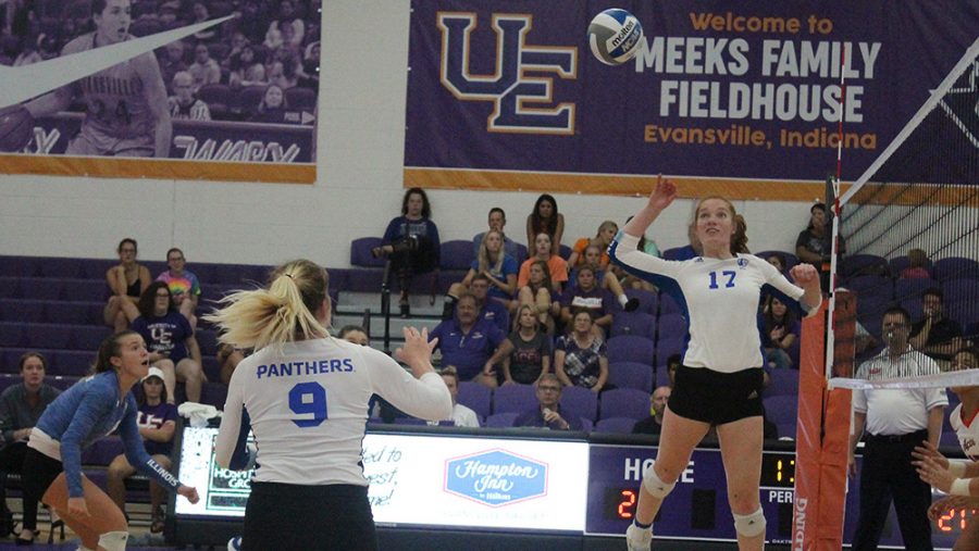 Adam Tumino | The Daily Eastern News
Eastern sophomore Hannah Sieg (17) goes up to kill a set from Bailey Chandler (9) in the Panthers 3-2 loss to Evansville on Sept. 14. Sieg had 9.5 points in the match. 
